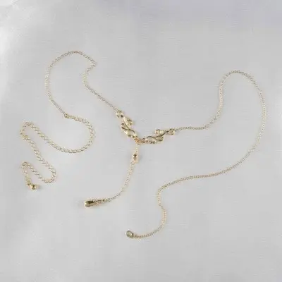 Human Behaviour - Gold Ornate Teardrop Pendant Waist Chain