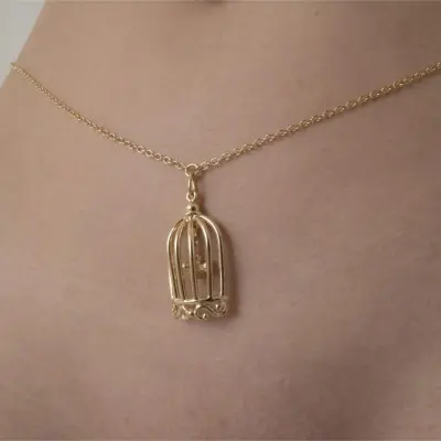 Cold Case Love - Gold Waist Chain with Bird in a Cage Pendant
