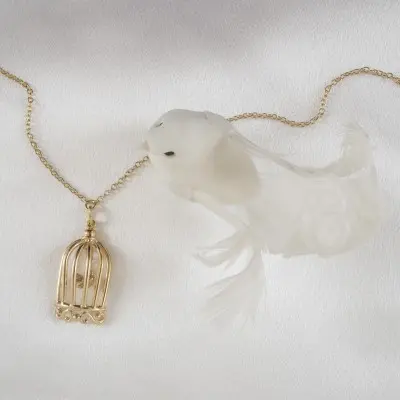 Cold Case Love - Gold Waist Chain with Bird in a Cage Pendant