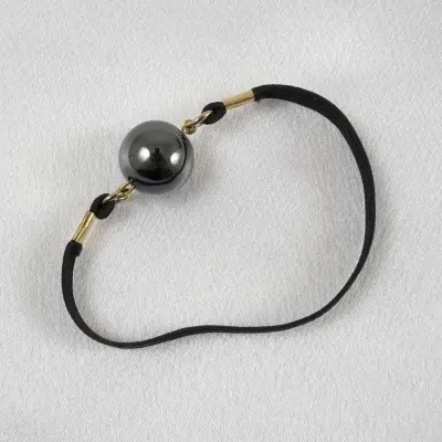 Infinity Ball - 24 Carat Gold Penis Band with Hematite Globe