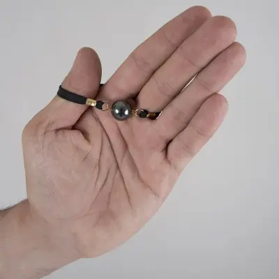 Infinity Ball - 24 Carat Gold Penis Band with Hematite Globe