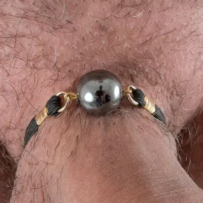 Infinity Ball - 24 Carat Gold Penis Band with Hematite Globe