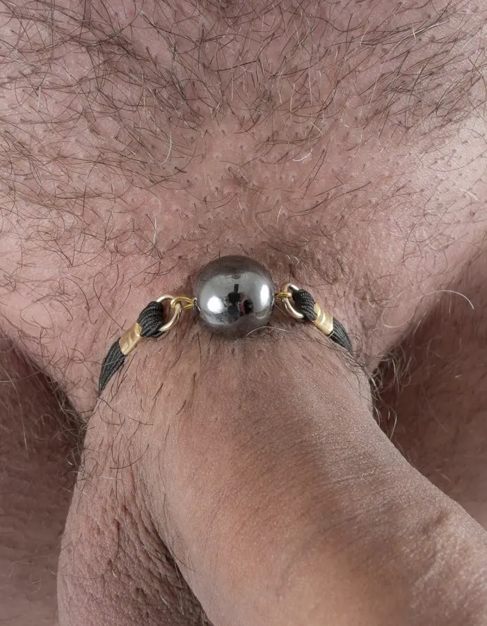 Infinity Ball - 24 Carat Gold Penis Band with Hematite Globe