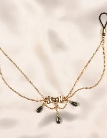 Love Me Harder - Nipple Chain in Gold With Bow Tie and Three Hematite Pendants