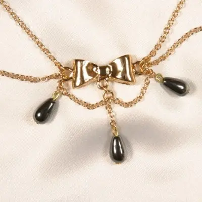 Love Me Harder - Nipple Chain in Gold With Bow Tie and Three Hematite Pendants