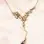 Nokomis - Gold Waist Chain with Ivy Charm